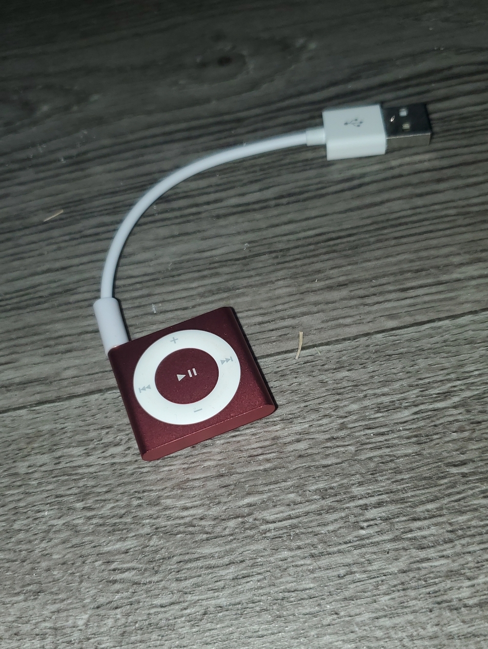 Vintage pink Apple iPod Shuffle (4th Generation, 2GB storage, Model A1373).